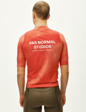 Pas Normal Studios Mechanism Stow Away Gilet - AOP Hibiscus Orange